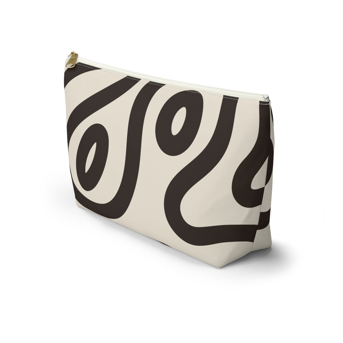 Side view of the black cream abstract makeup bag