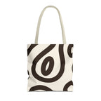 Black cream abstract tote bag with beige handles on a white background