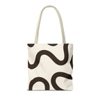 Second view of the black cream abstract tote bag showing the wavy loop print