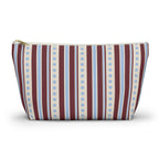 Blue burgundy dot striped makeup bag with T-bottom and gold zipper pull, front view