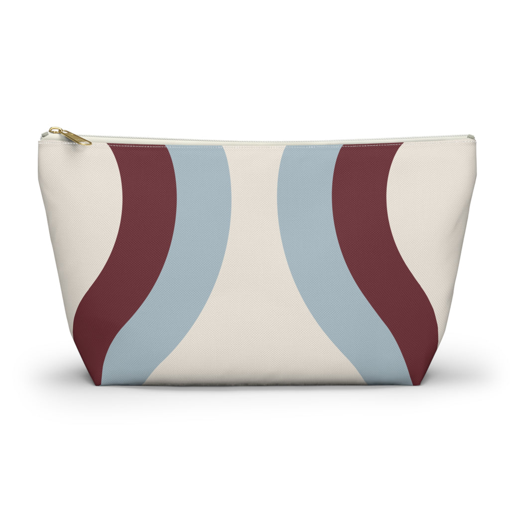 Blue burgundy wavy makeup bag with gold zipper pull, front view on white background
