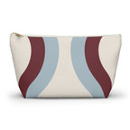 Blue burgundy wavy makeup bag with gold zipper pull, front view on white background