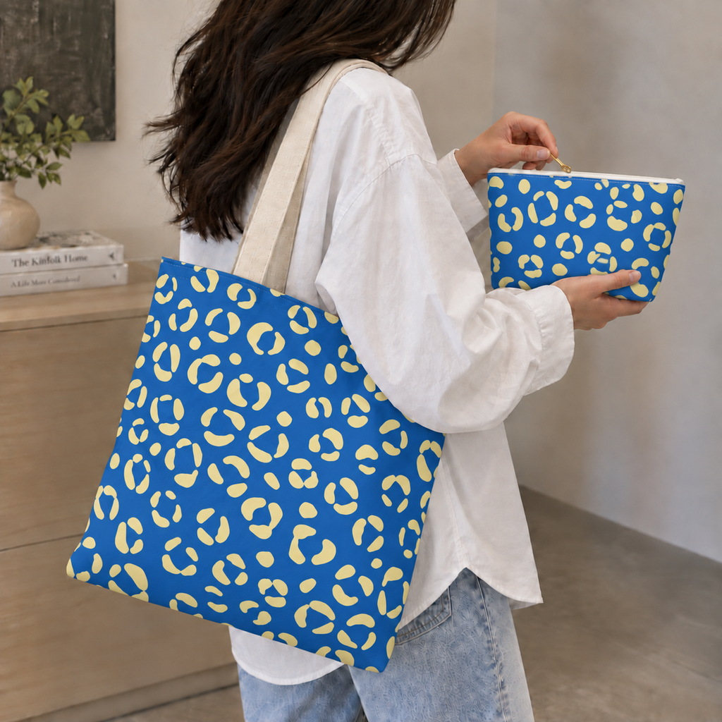 Woman with the blue leopard print tote bag and matching makeup bag