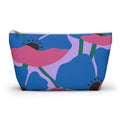 Blue and pink poppy floral makeup bag with gold zipper pull on a white background