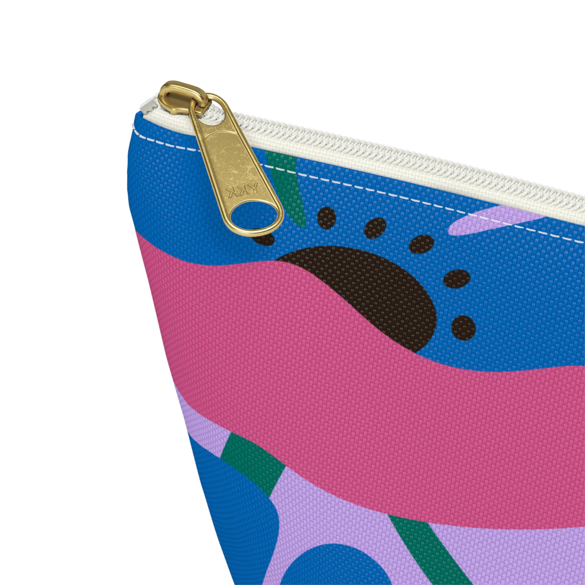 Close-up of the gold zipper pull on the blue pink poppy floral makeup bag