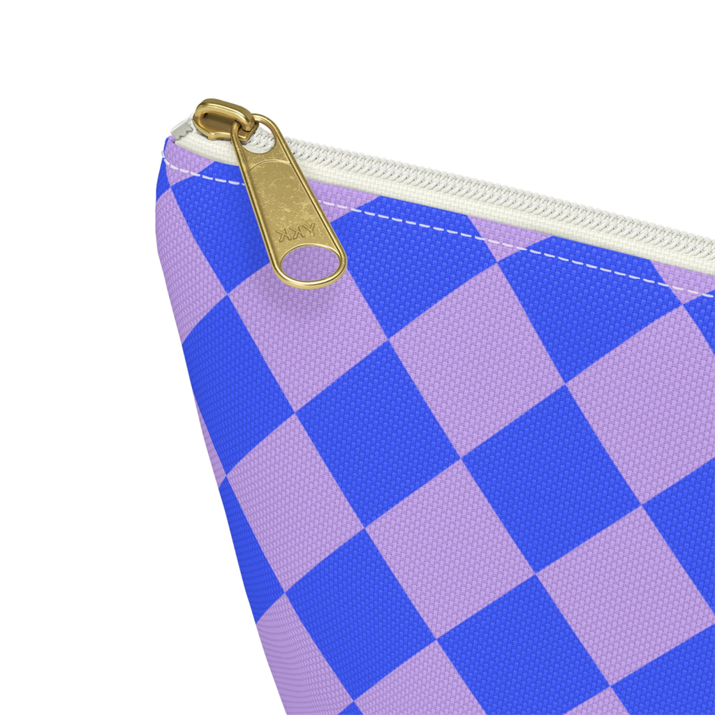 Close-up of the gold zipper pull and blue lilac diamond checks on the makeup bag