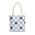 Blue Smiley Face Checkered Tote Bag with a blue and cream checkerboard print and brown smiley faces, front view