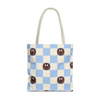 Blue Smiley Face Checkered Tote Bag with a blue and cream checkerboard print and brown smiley faces, front view