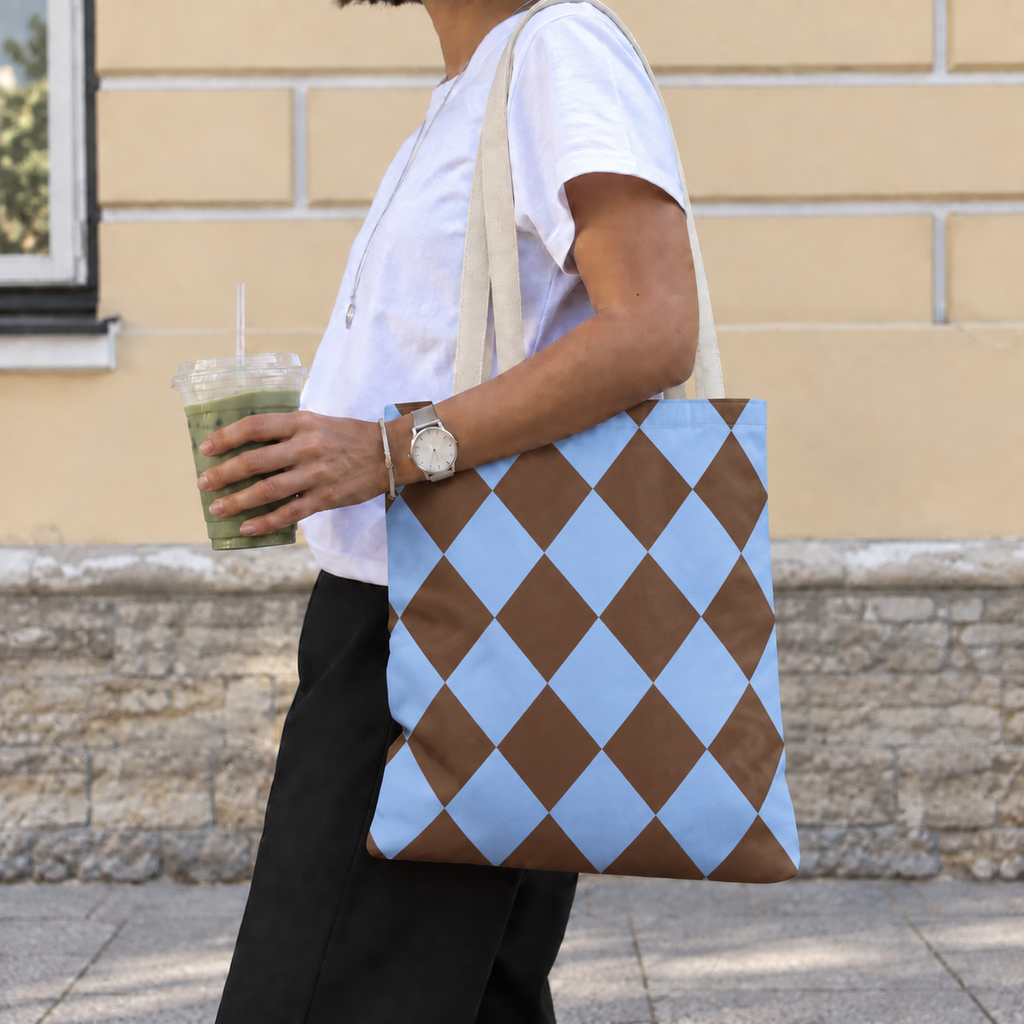 Woman walking with a brown blue diamond checkered tote bag over her shoulder