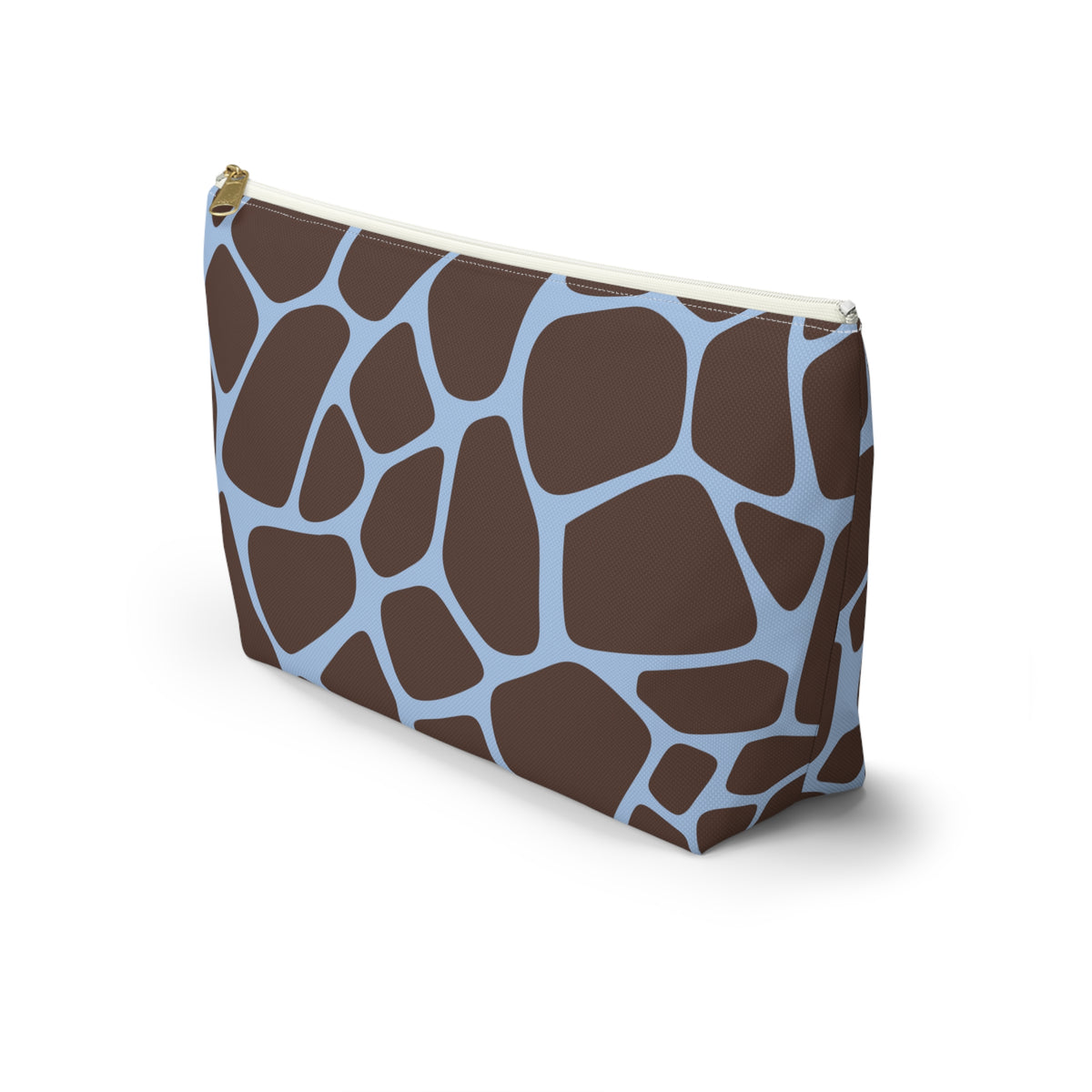 Side view of the giraffe print makeup bag in brown and blue