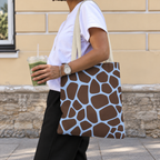 Woman with a brown blue giraffe print tote bag on her shoulder walking outdoors