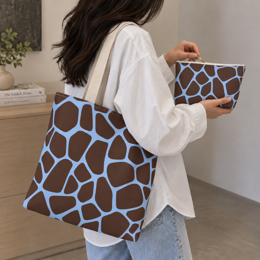 Brown blue giraffe print tote bag on the shoulder with the matching makeup bag