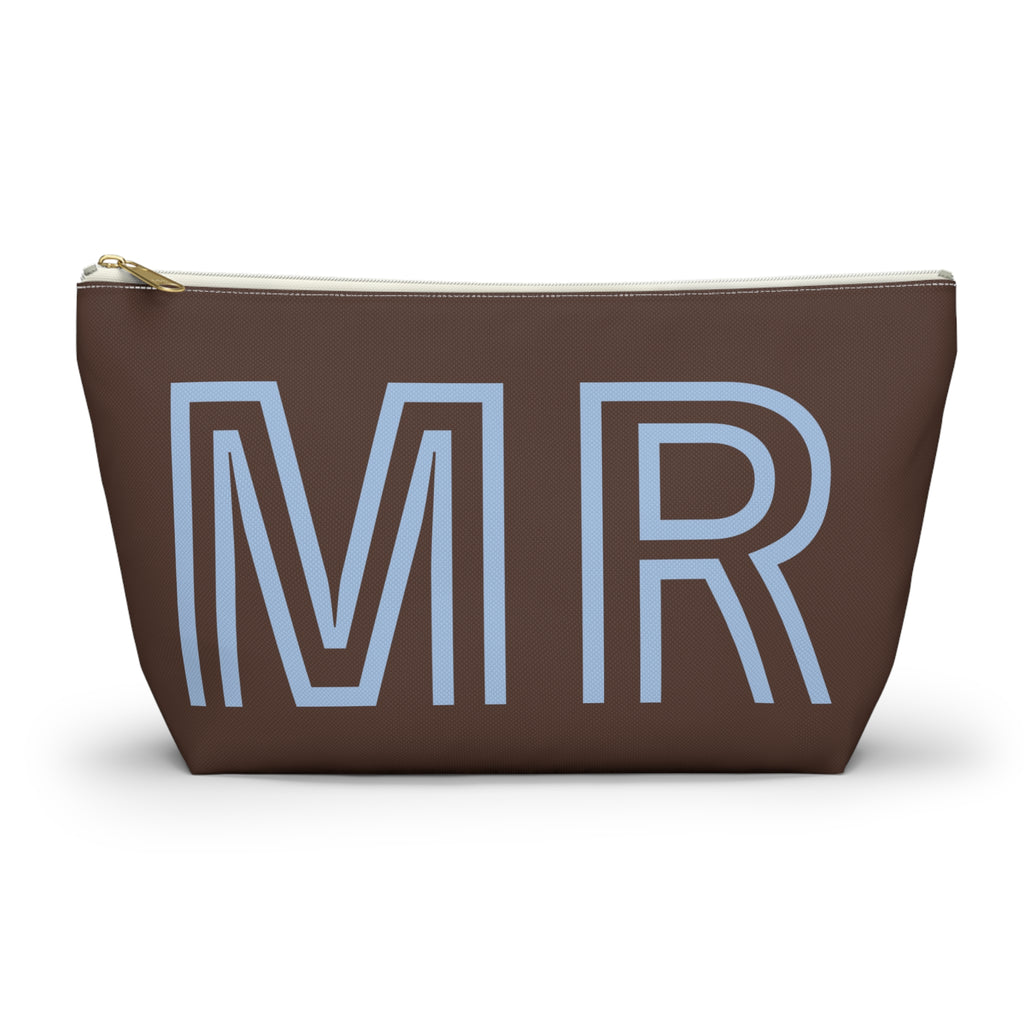 Brown personalized makeup bag with light blue outlined MR initials and gold zipper pull