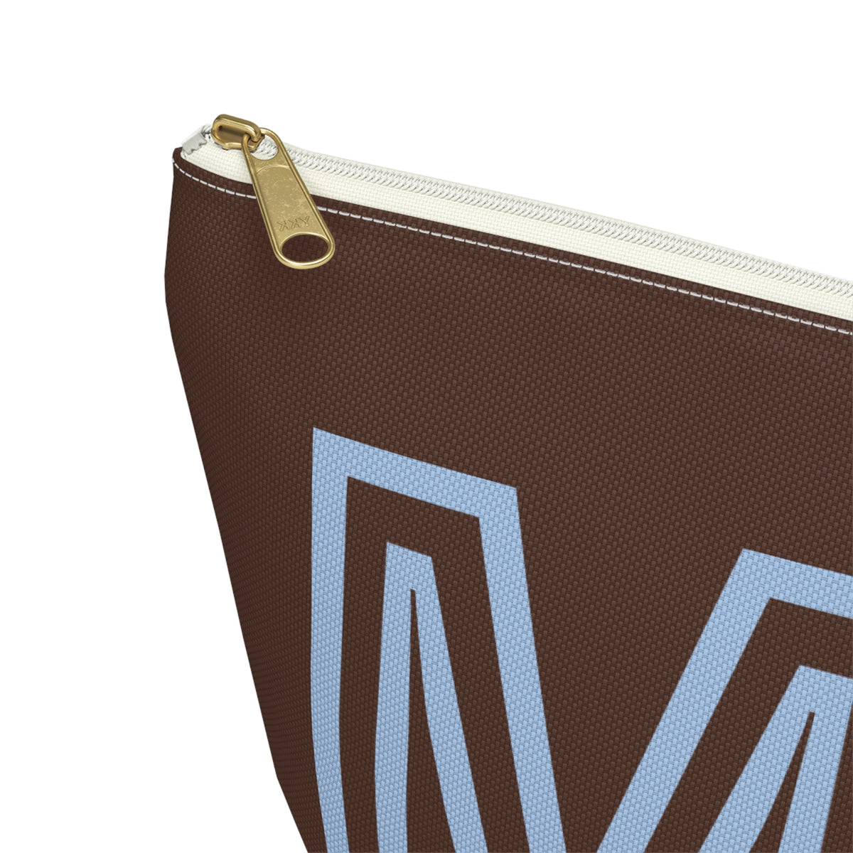 Close-up of the gold zipper pull on the brown personalized makeup bag