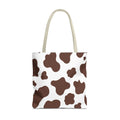 Brown Cow Print Tote Bag with brown patches on a white background, front view