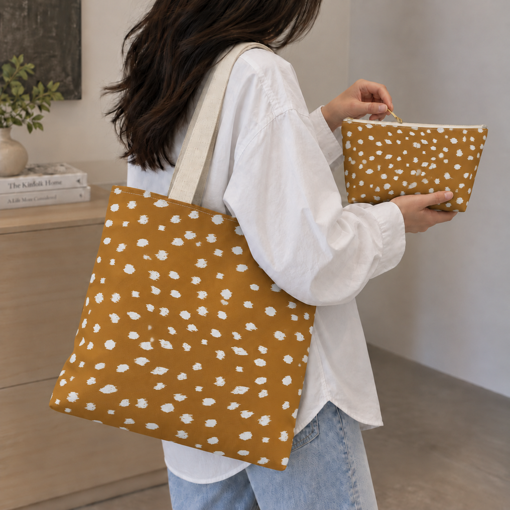 Woman carrying the matching tote bag and Brown Fawn Spotted makeup bag