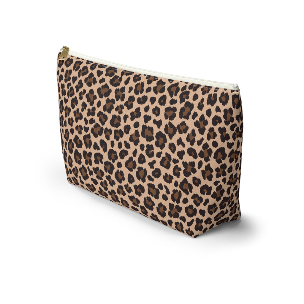 Side view of the brown leopard print makeup bag standing upright