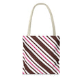 Brown pink diagonal striped tote bag with beige handles, front view on white background