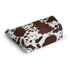 Brown white cow print makeup bag lying flat showing the T-bottom shape