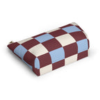 Burgundy blue cream checkered makeup bag lying on its side showing the checkered pattern
