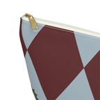 Close-up of the gold zipper pull and burgundy blue diamond print on the makeup bag