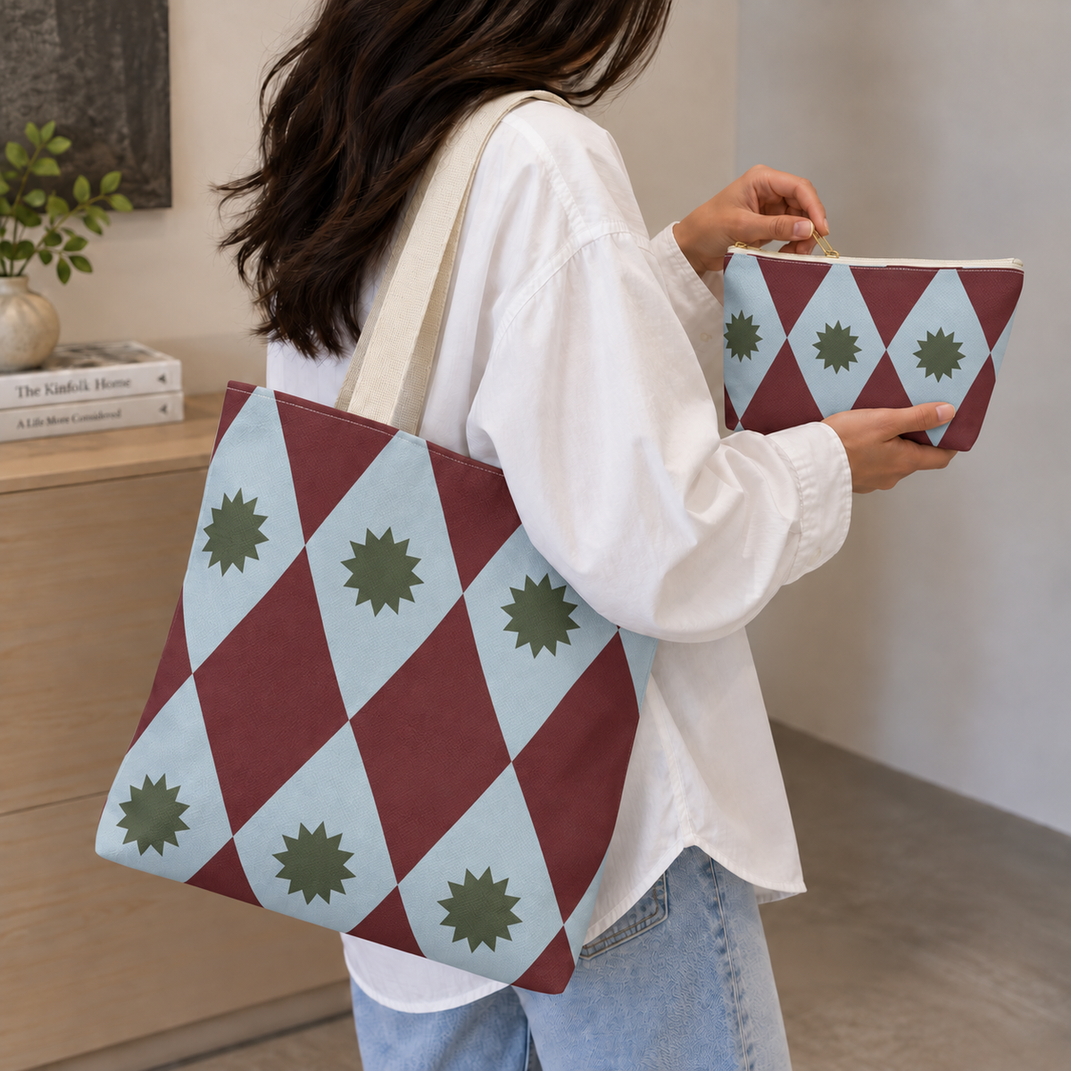 Woman carrying the burgundy blue diamond tote bag with the matching makeup bag