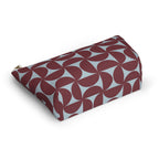 Burgundy blue geometric makeup bag lying flat at an angle