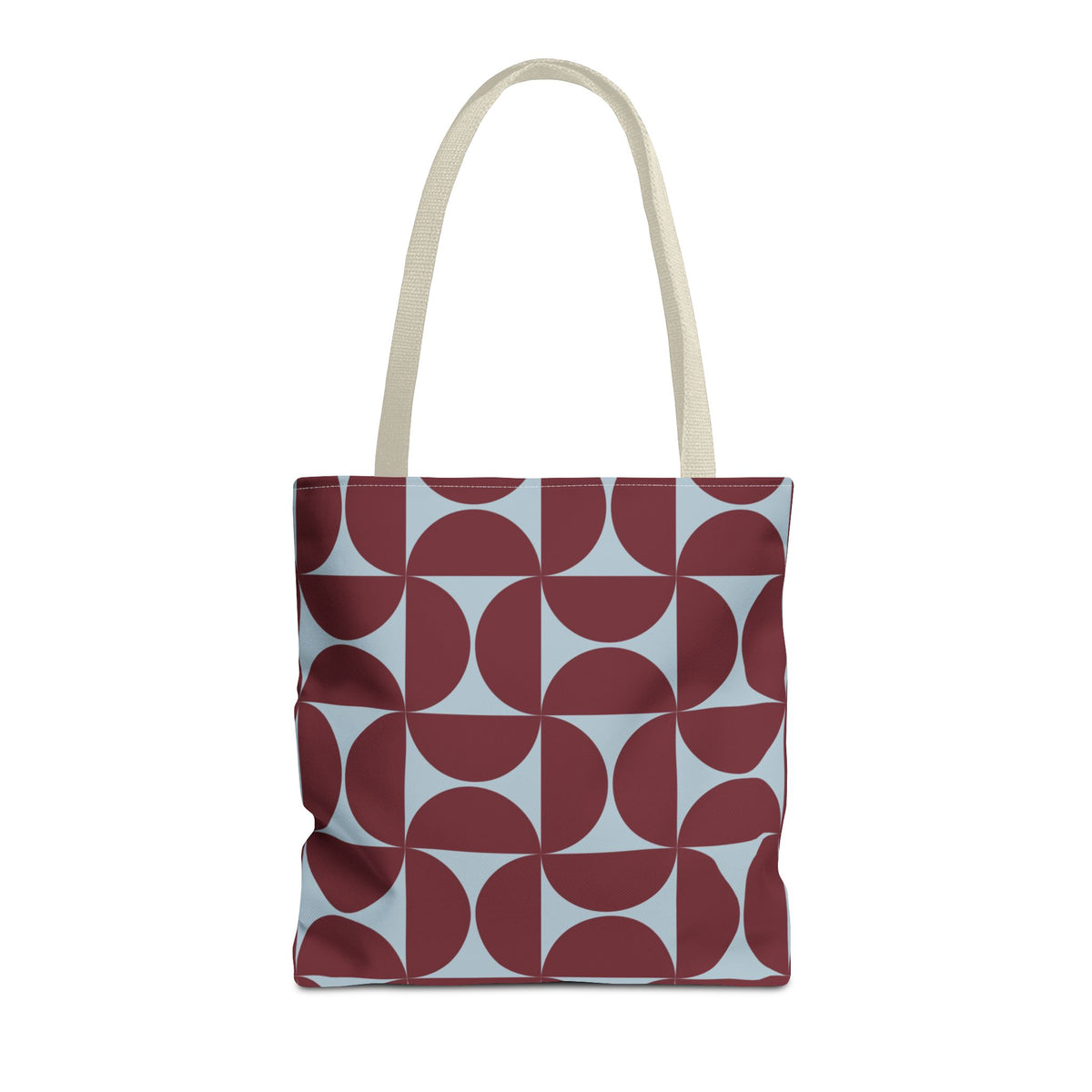 Burgundy blue geometric tote bag with beige handles on a white background