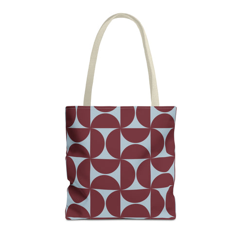 Burgundy blue geometric tote bag with beige handles on a white background