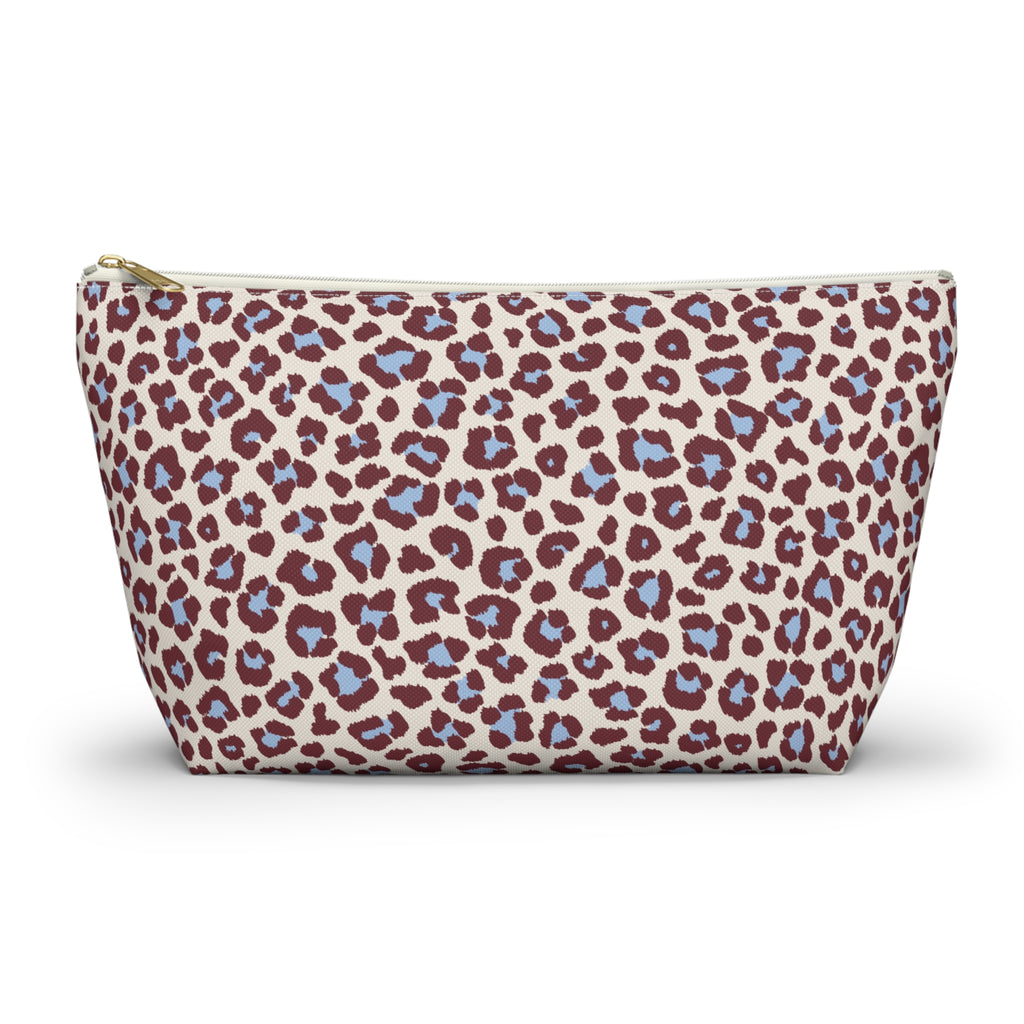 Burgundy Blue Leopard Print Makeup Bag with burgundy and blue spots on blush pink, front view