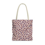 Burgundy Blue Leopard Print Tote Bag with burgundy and blue spots on blush pink, front view