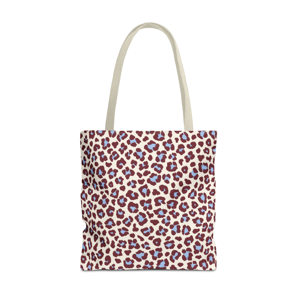Burgundy Blue Leopard Print Tote Bag with burgundy and blue spots on blush pink, front view