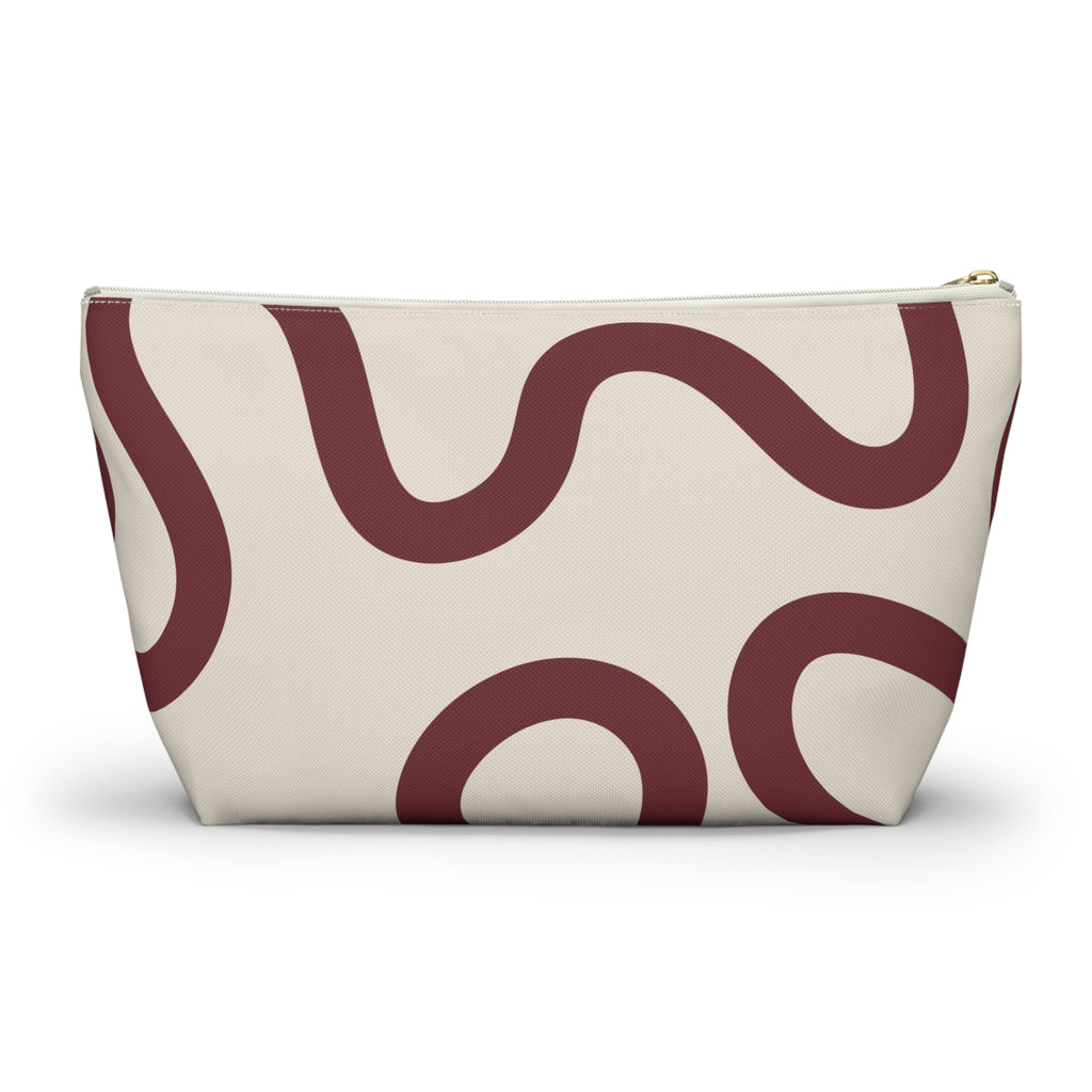 Back view of the burgundy cream abstract makeup bag