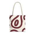 Burgundy cream abstract tote bag with beige handles on a white background