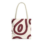 Burgundy cream abstract tote bag with beige handles on a white background