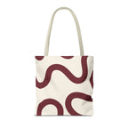 Second view of the burgundy cream abstract tote bag showing the wavy line print