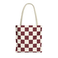 Burgundy cream checkered tote bag with beige handles on a white background