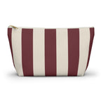 Burgundy cream striped makeup bag with T-bottom and gold zipper pull, front view