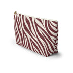 Side view of the burgundy cream zebra print makeup bag standing upright