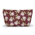 Burgundy daisy floral makeup bag with gold zipper pull, front view on white background