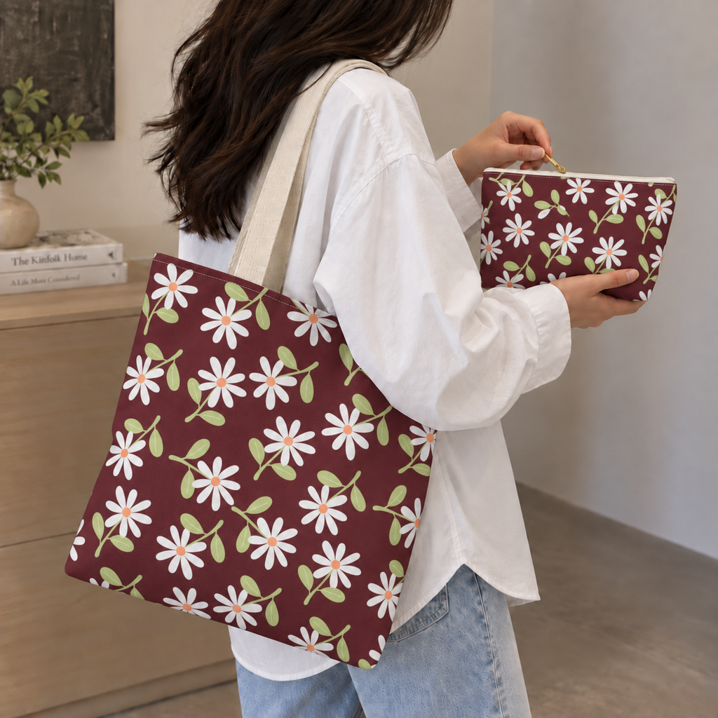 Woman carrying the matching daisy floral tote bag with the makeup bag in her hand