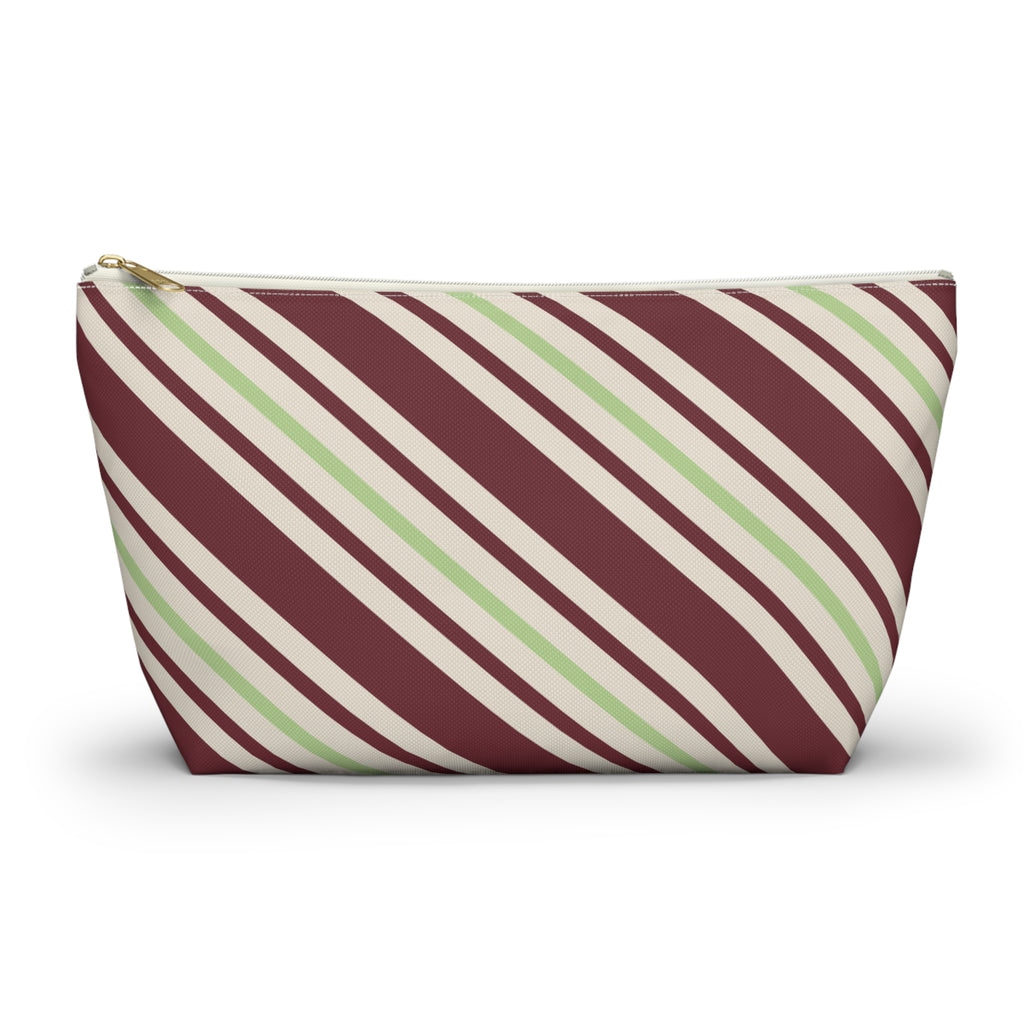 Burgundy green diagonal striped makeup bag with gold zipper pull, front view