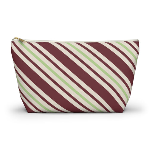 Burgundy green diagonal striped makeup bag with gold zipper pull, front view