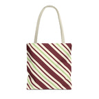 Burgundy green diagonal striped tote bag with cream handles on a white background