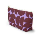 Side view of the burgundy lilac half circle makeup bag with flat T-shaped bottom
