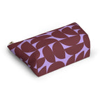 Burgundy lilac half circle makeup bag lying on its side in an angled view