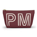Burgundy monogram personalized makeup bag with cream outlined initials and gold zipper pull