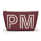 Burgundy monogram personalized makeup bag with cream outlined initials and gold zipper pull