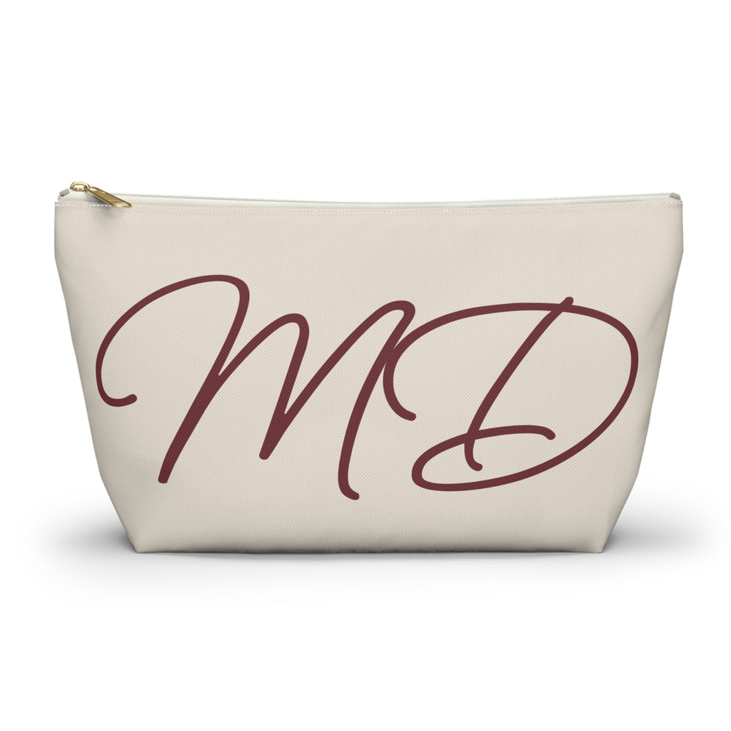Cream burgundy monogram personalized makeup bag with script initials MD, front view