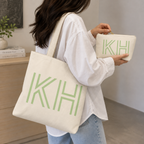 Woman carrying the matching tote bag and Cream Green Monogram personalized makeup bag